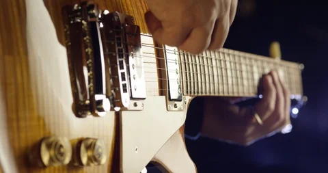 Guitar player playing guitar Stock Footage 114833782