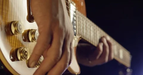Guitar player playing guitar Stock Footage 114834056