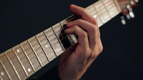 Guitar player practicing guitar - close up Stock Footage 35976128