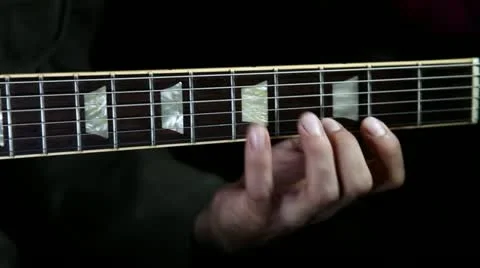 Guitar player practicing scales in a electric guitar Stock Footage 21439857