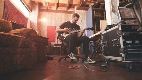 Guitar Player Recording Low Angle Wide Pull Back Stock Footage 89541128