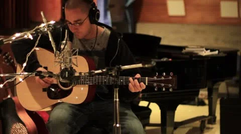 Guitar player in recording studio Stock Footage 8848931