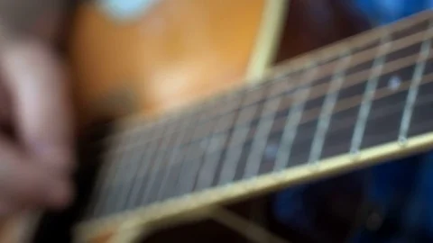 Guitar player, shallow focus Stock Footage 76296408