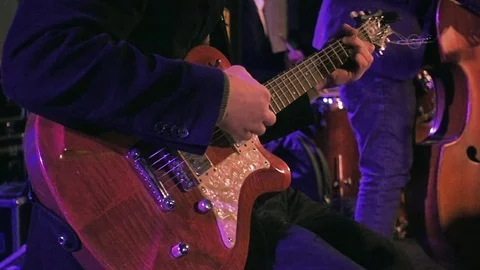 Guitar player on the stage slow motion Stock Footage 73458438