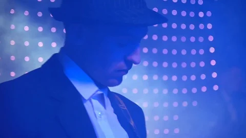 The guitar player is very active on stage with his rock band.  close-up,  fla Video stock 91684270