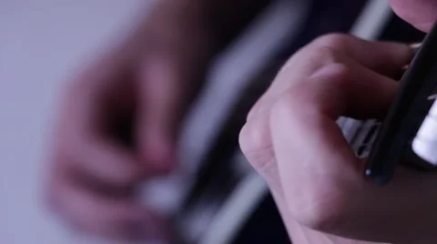 Guitar player,close up on fingers,depth of field between left hand and right han Stock Footage 56480861