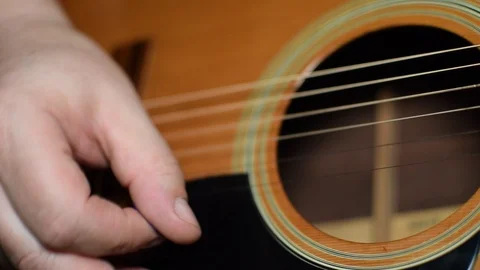 Guitar playing close up with shallow depth of field Stock Footage 87746926