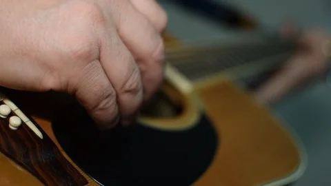 Guitar playing close up with shallow depth of field Stock Footage 87747881