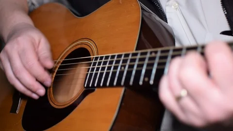 Guitar playing close up with shallow depth of field Stock Footage 87751095