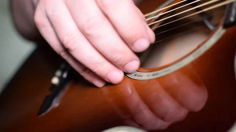 Guitar playing close up with shallow depth of field Stock Footage 87751219
