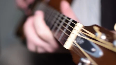 Guitar playing close up with shallow depth of field Stock Footage 87751685