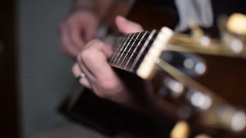 Guitar playing close up with shallow depth of field Stock Footage 87751715