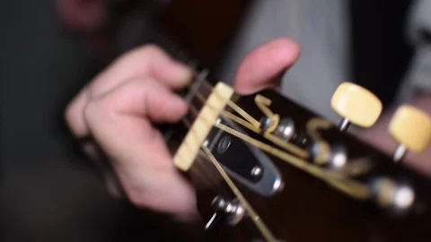 Guitar playing close up with shallow depth of field Stock Footage 87751833