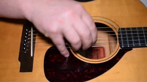 Guitar playing close up with shallow depth of field Stock Footage 87752002