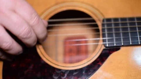 Guitar playing close up with shallow depth of field Stock Footage 87752142