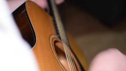 Guitar playing close up with shallow depth of field Stock Footage 87752146