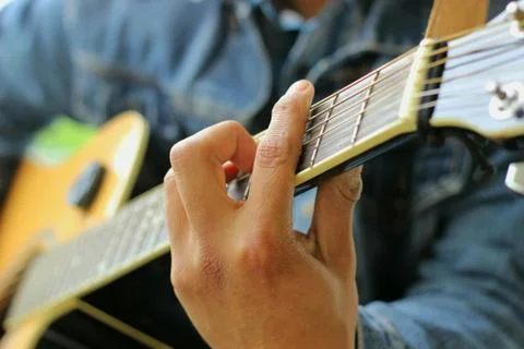 Guitar playing Stock Photos