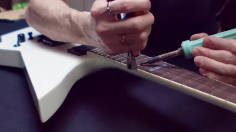 Guitar problem solving Video stock 105263229