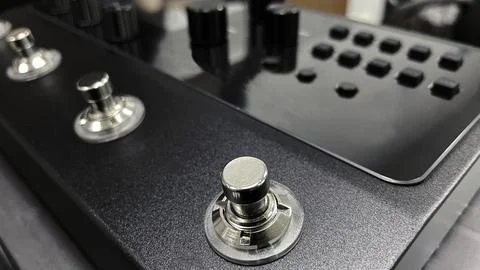 Guitar processor in a metal case for playing electric, acoustic and bass guit Stock Photos