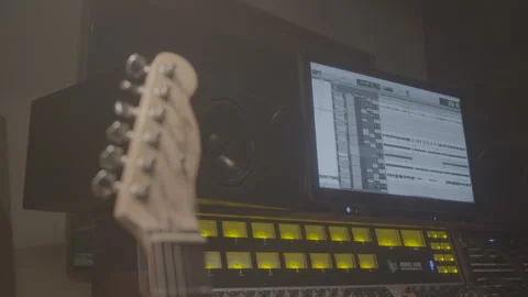 Guitar Propped up in Front of Soundboard Video stock 165609565