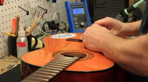 Guitar Restringing Stock Footage 32425430