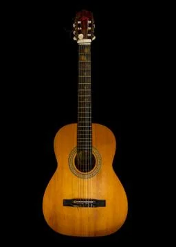 Guitar with six strings on black background Stock Photos