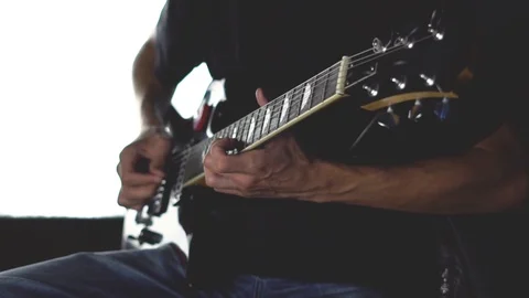 Guitar solo in the Studio Stockbeeldmateriaal 93174335