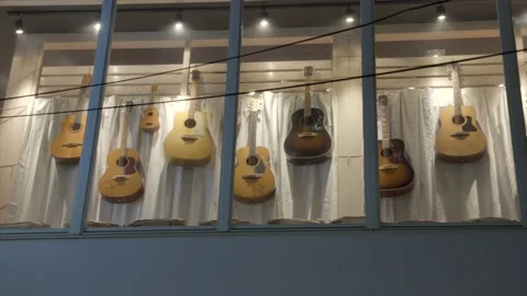 Guitar store front display window Stock Footage 231835045