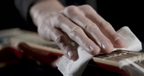Guitar string cleaning Stock Footage 101597153