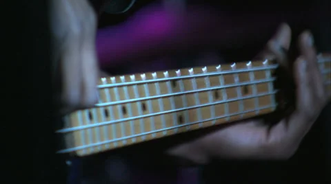 GUITAR STRINGS BEING PLAYED close up Stock Footage 38285589