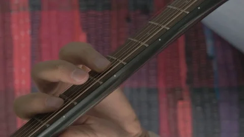 Guitar strings closeup. A man plays gitare Video stock 73976382