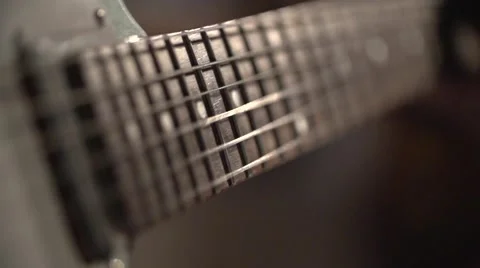 Guitar strings shiver on slow-motion shot Stock-Footage 55645895
