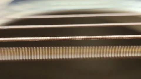 Guitar strings vibrate when touched. 스톡 동영상 211781947