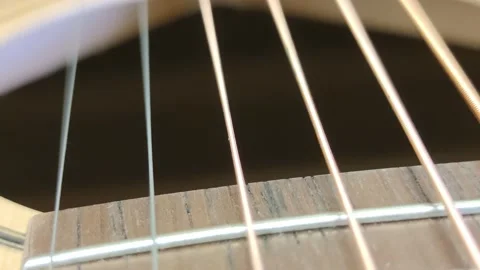 Guitar strings vibrate when touched. 스톡 동영상 211781951