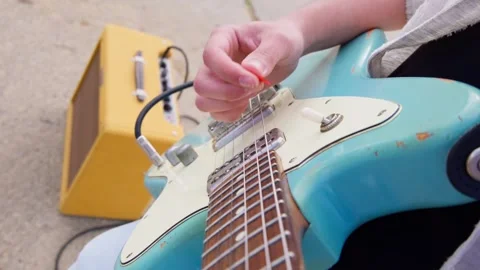Guitar strumming pov Stock Footage 289306643