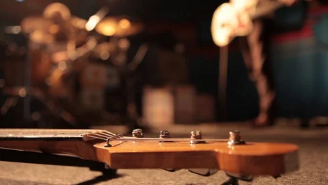 Guitar on the studio floor Stock Footage 127569544