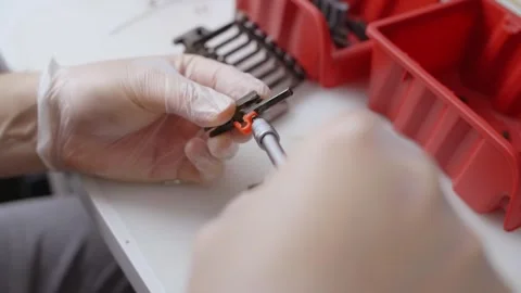 Guitar tech disassembles the guitar's hardware, repair workshop, 4k 10 bit Stock Footage 289777812