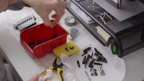 Guitar tech does deep cleaning of the guitar's hardware, repair of the musical Stock Footage 282881656