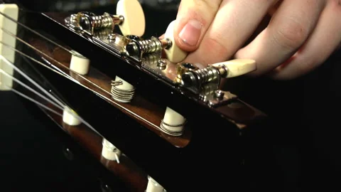 Guitar tuning Stock Footage 169453320