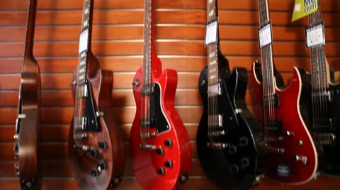 Guitar Wall Display - Med Stock Footage 32425418