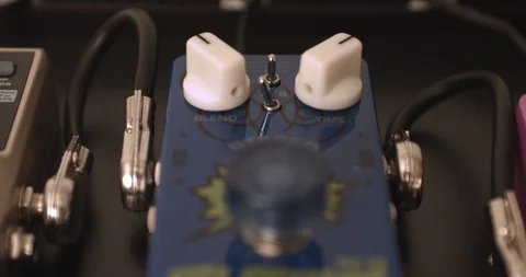 Guitarist Adjusting Knobs And Switches On Reverb Guitar Effect Pedal 스톡 동영상 114638077