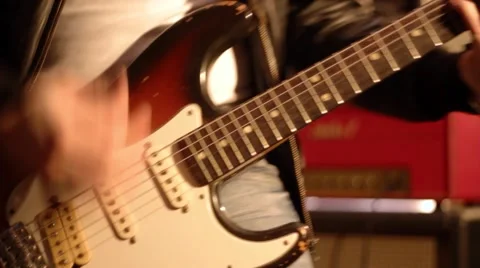 Guitarist. Close-up on a male hand playing on a electric guitar and then stop 動画素材 59552271