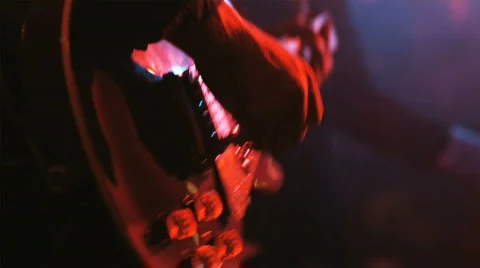 Guitarist playing in a rock and roll concert with a band Stock Footage