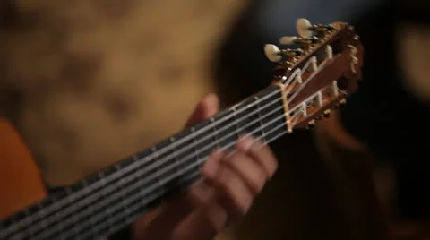 Guitarist pluck the strings. 스톡 동영상 22561238
