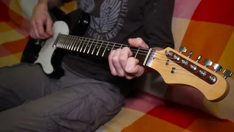 Guitarist is touching the strings Stock Footage 71091518