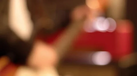 Guitarist. Unsharp close-up on a male hand playing hard on a electric guitar Stock Footage 59552243