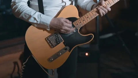 Guitarist at Work Close Up 動画素材 76318587