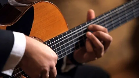 Guitarists fingers Stock Footage 100239791