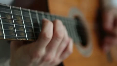 Guitarplaying closeup Stock Footage 267748175