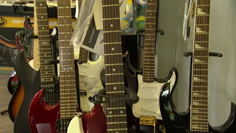 Guitars on display Stock Footage 166864154